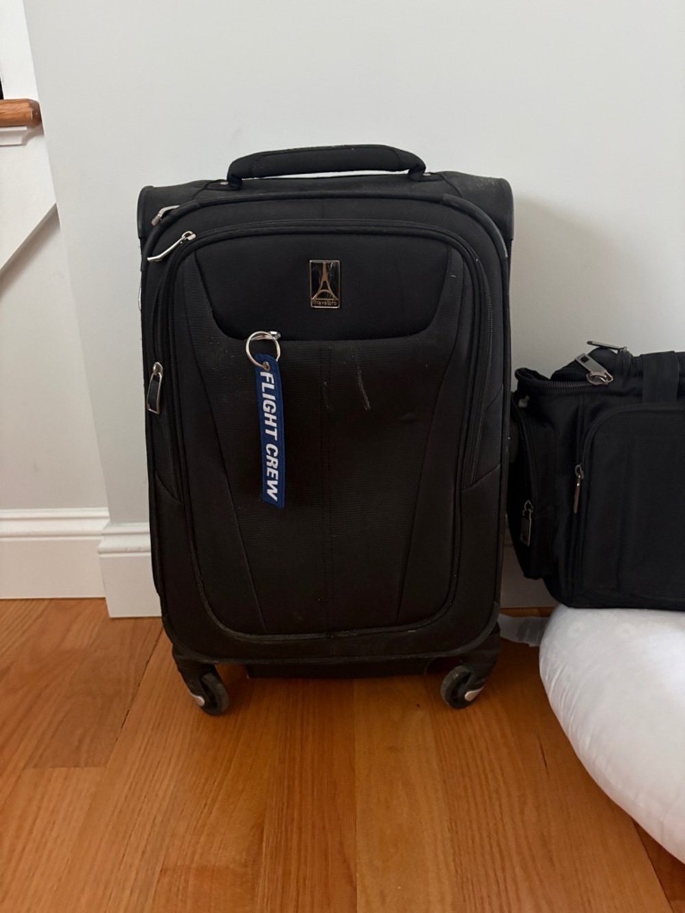 Travel Pro Black Carry-On Spinner Luggage with Top Handle - Flight Crew Tag